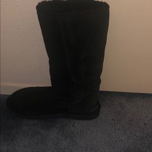 Tall black UGG boots